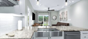 Welcome to “Gruene Lily Pad” a new river front condo steps away from Gruene! 