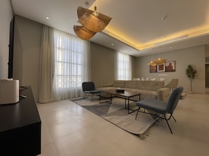 Appartement Design, 3 chambres | Coin séjour | Télévision à écran plat