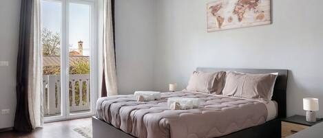 2 dormitorios, tabla de planchar con plancha, wifi gratis y ropa de cama