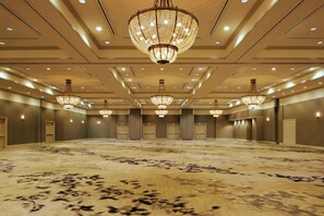 A large, empty hotel conference room with multiple chandeliers, recessed lighting, and a patterned carpet. - 2 Connecting Suites at a 5⭐️ Hotel (Miami)