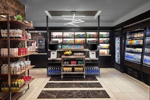 A self-checkout area with a variety of packaged goods and beverages. - 2 Connecting Suites at a 4⭐️ Hotel (Arlington)