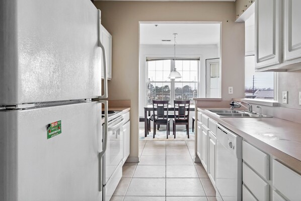 Condo, Multiple Beds, Balcony | Private kitchen | Fridge, microwave, oven, stovetop - Sandpiper Village #1 (Rehoboth Beach)