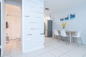 Townhome, Multiple Beds, Patio, Garden View (Beachside Palms) | In-room dining