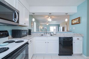 Townhome, Multiple Beds, Patio, Garden View (Rum Runner's Retreat) | Private kitchen | Fridge, microwave, oven, stovetop