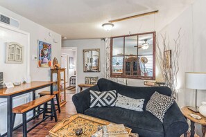 Condo, 1 Queen Bed, Patio, Garden View (Eclectic Comfort) | Living area | 42-inch flat-screen TV with digital channels - Cozy Retreat in Central East Austin (Austin)