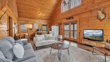 Cabin, Multiple Beds, Hot Tub, Mountain View (Moosehead Lodge) | Living area | 42-inch flat-screen TV with digital channels, fireplace