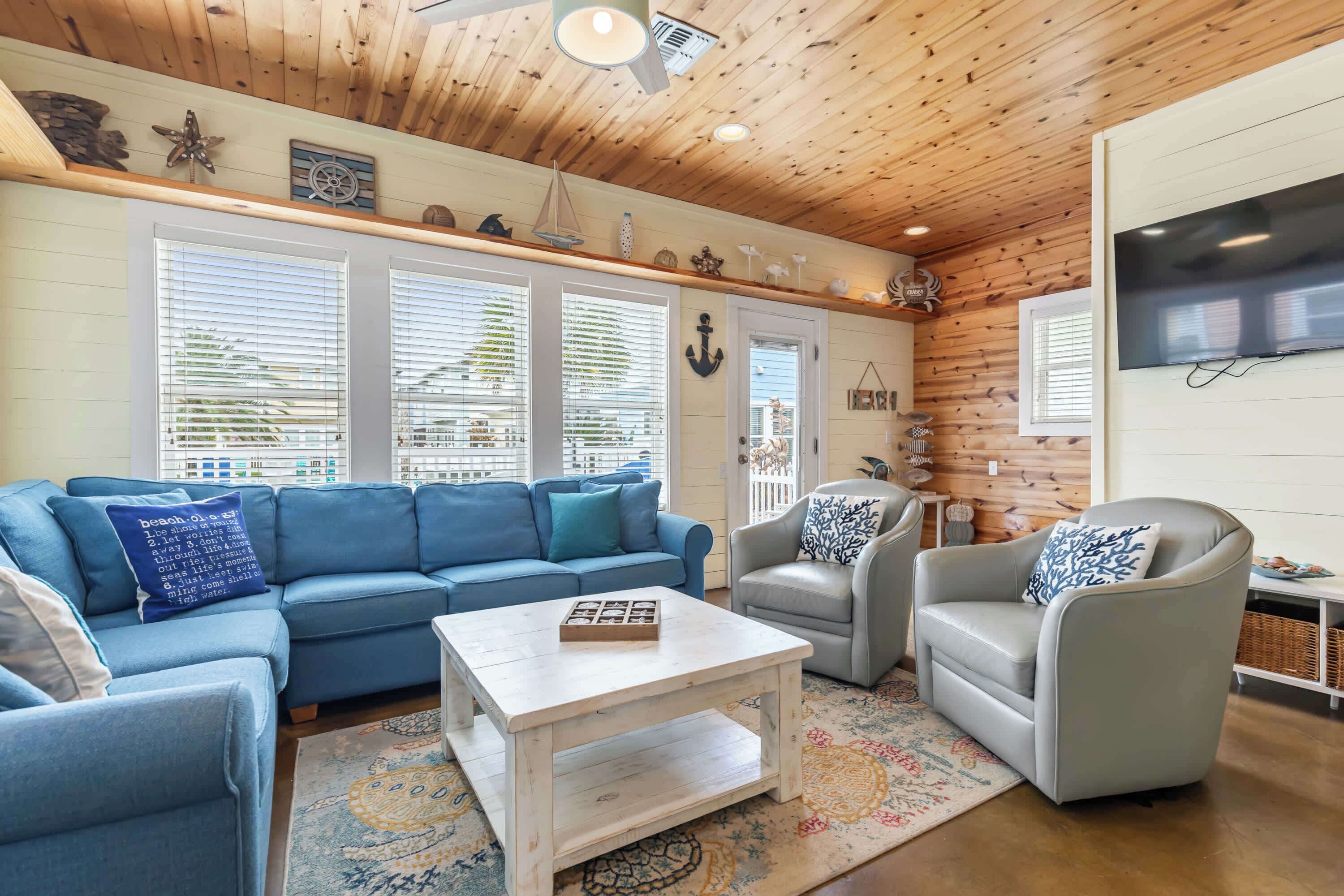 House, Multiple Beds, Patio, Pool View (Dockside) | Living area | 42-inch flat-screen TV with digital channels