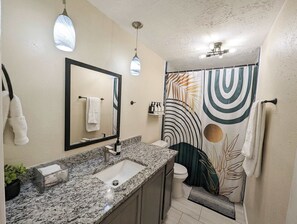 House, Multiple Beds, Hot Tub, Garden View (Vibrant Getaway) | Bathroom | Combined shower/tub, hair dryer, towels