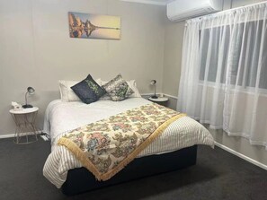 2 dormitorios, tabla de planchar con plancha, wifi gratis y ropa de cama