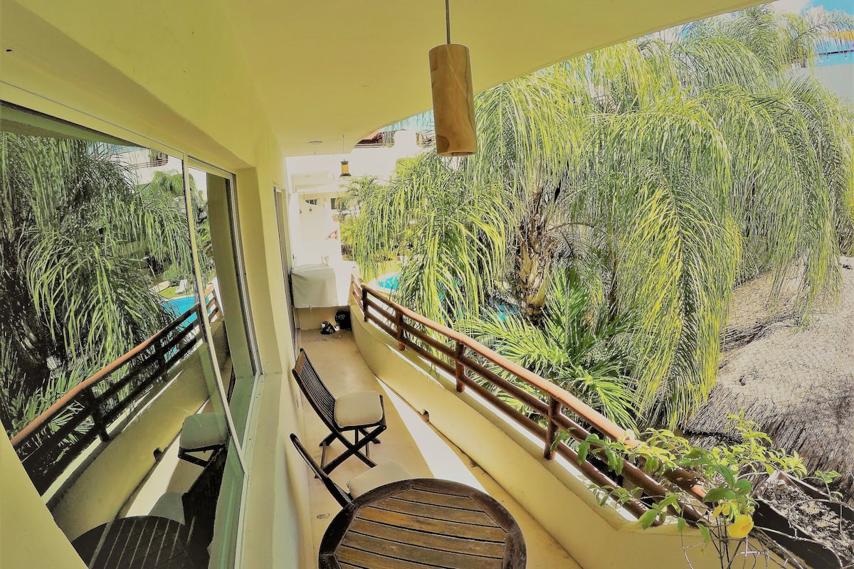 Departamento estándar, vista a la alberca | Terraza o patio