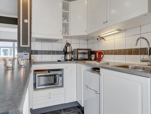 Fridge, microwave, cookware/dishes/utensils