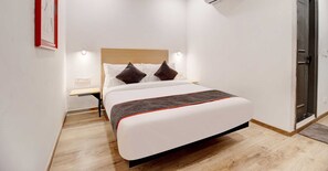 Chambre classique double ou avec lits jumeaux | Espace de travail pour ordinateurs portables, literie fournie