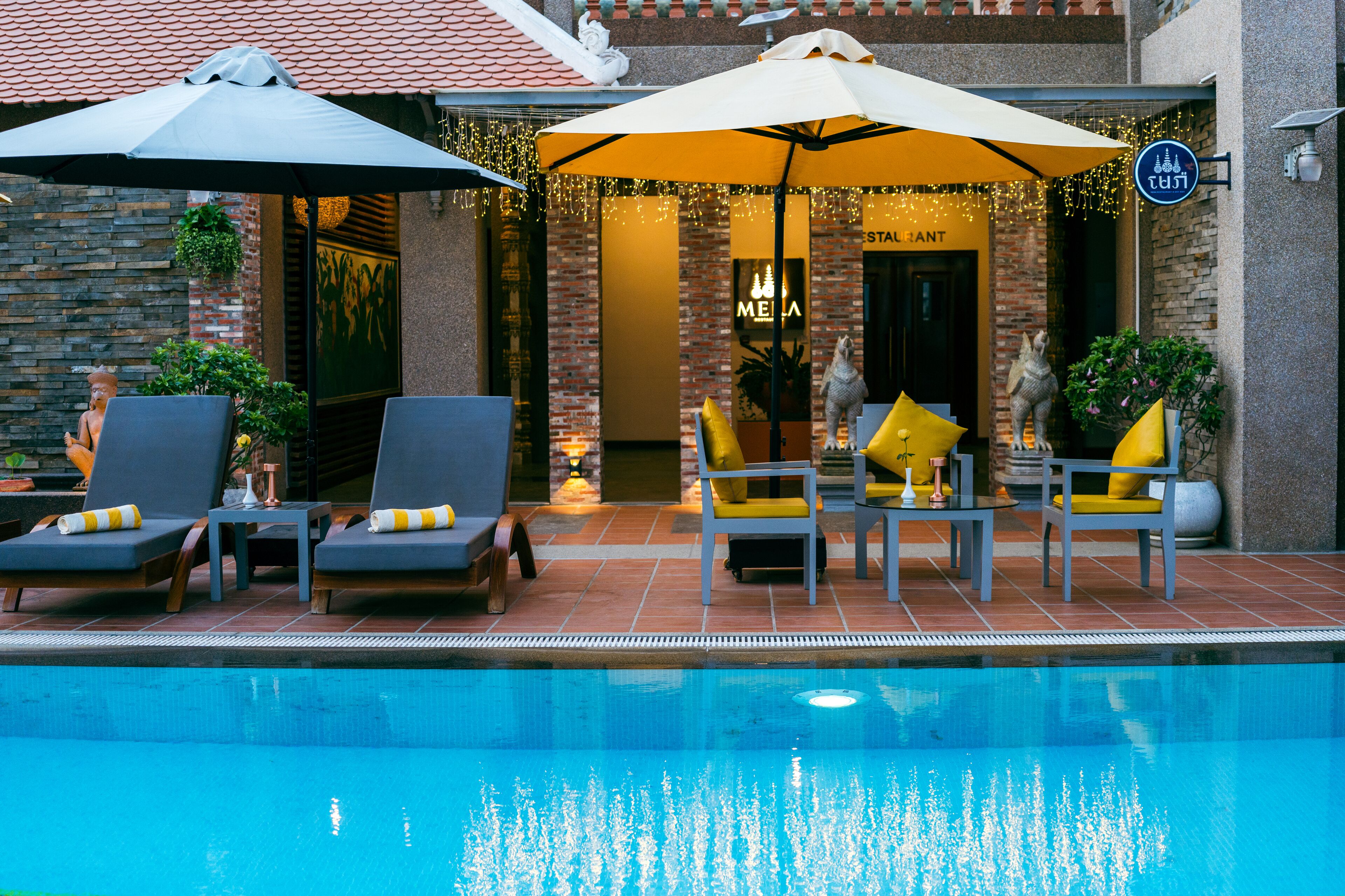 Outdoor pool, pool umbrellas, pool loungers