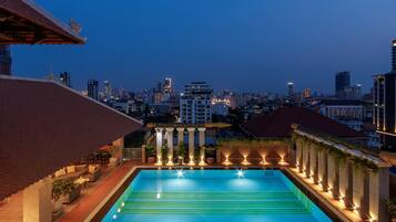 Outdoor pool, pool umbrellas, sun loungers