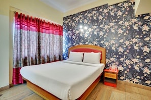 Deluxe Room, City View | 1 bedroom - iROOMZ Aura Inn (Bengaluru)