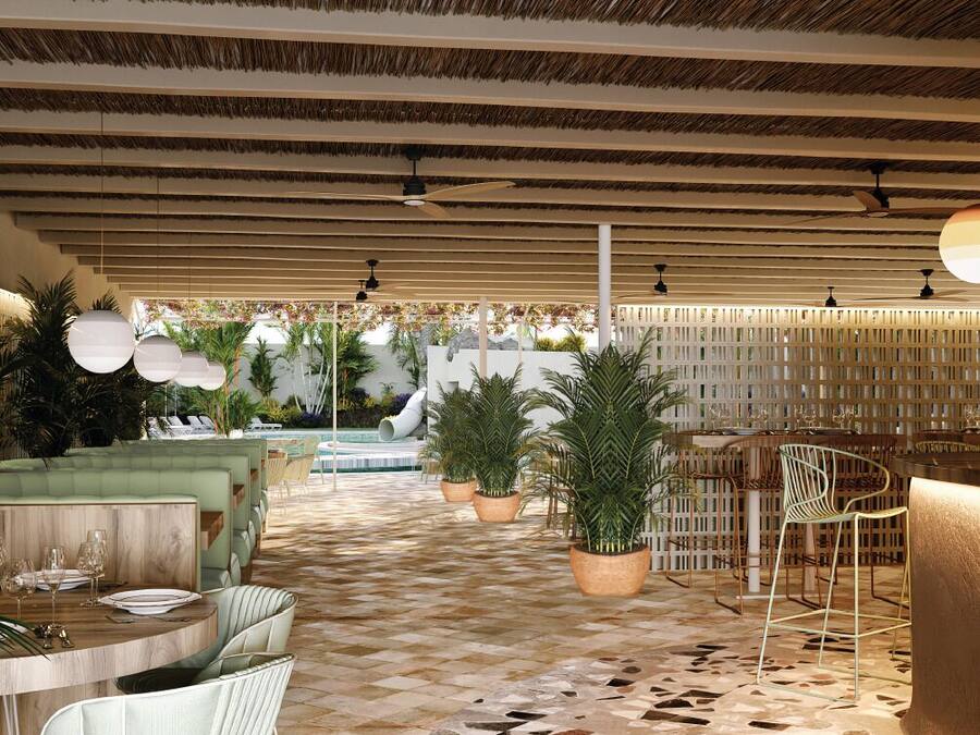An outdoor dining area with a checkered floor, round tables, and chairs. There are potted plants and a pool in the background.