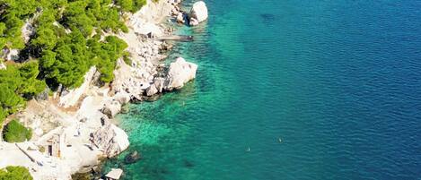 On the beach, sun loungers