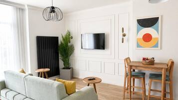 Standard Room, Non Smoking, Kitchenette | Living area | 55-inch Smart TV with digital channels, Netflix, streaming services