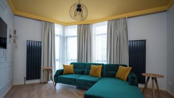 Panoramic Suite | Living area | 55-inch Smart TV with digital channels, Netflix, streaming services