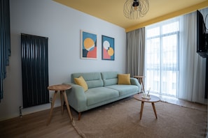 Luxury Duplex | Living area | 55-inch Smart TV with digital channels, Netflix, streaming services - Bird Nest Suite (Istanbul)