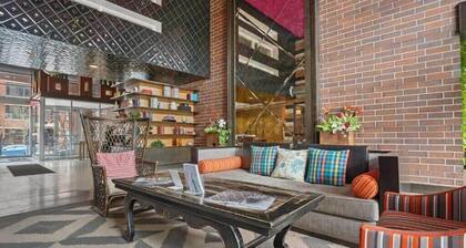 CozySuites 2BR Mill District with pool, gym # 01