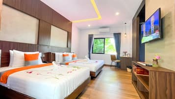 Familien-Studiosuite, Balkon (Free Bus Station Pick Up) | Minibar, Zimmersafe, individuell dekoriert, individuell eingerichtet