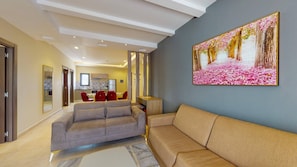 Apartamento ejecutivo, varias camas, cocina | Ropa de cama de alta calidad, minibar, decoración individual