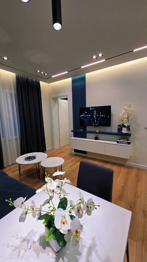 Apartment, Balcony | Living area | 42-inch flat-screen TV with cable channels - Arkle 2 Apartments  (Tirana)
