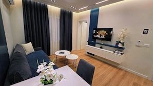 Apartment, Balcony | Living area | 42-inch flat-screen TV with cable channels - Arkle 2 Apartments  (Tirana)