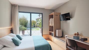1 dormitorio, caja fuerte, espacio para trabajar con un portátil