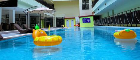 Outdoor pool, open 7:00 AM to 11:00 PM, pool umbrellas