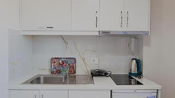 Apartment, Sea View | Private kitchen | Fridge