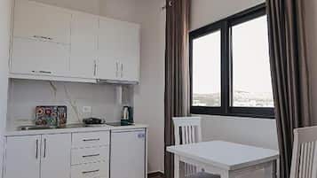 Chambre Triple Deluxe | Cuisine privée | Réfrigérateur