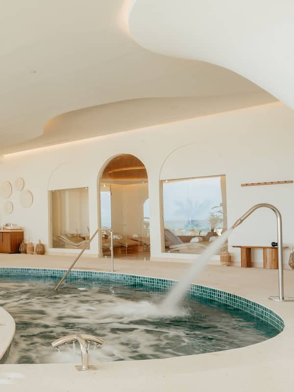 Couples treatment rooms, sauna, hot tub, steam room, hot stone massages