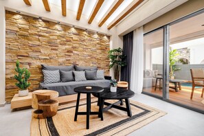 Exclusive Apartment, Private Pool | Living area | 55-inch Smart TV with satellite channels, computer monitors - Legato Spa Suites With Private Pool (Naxos)