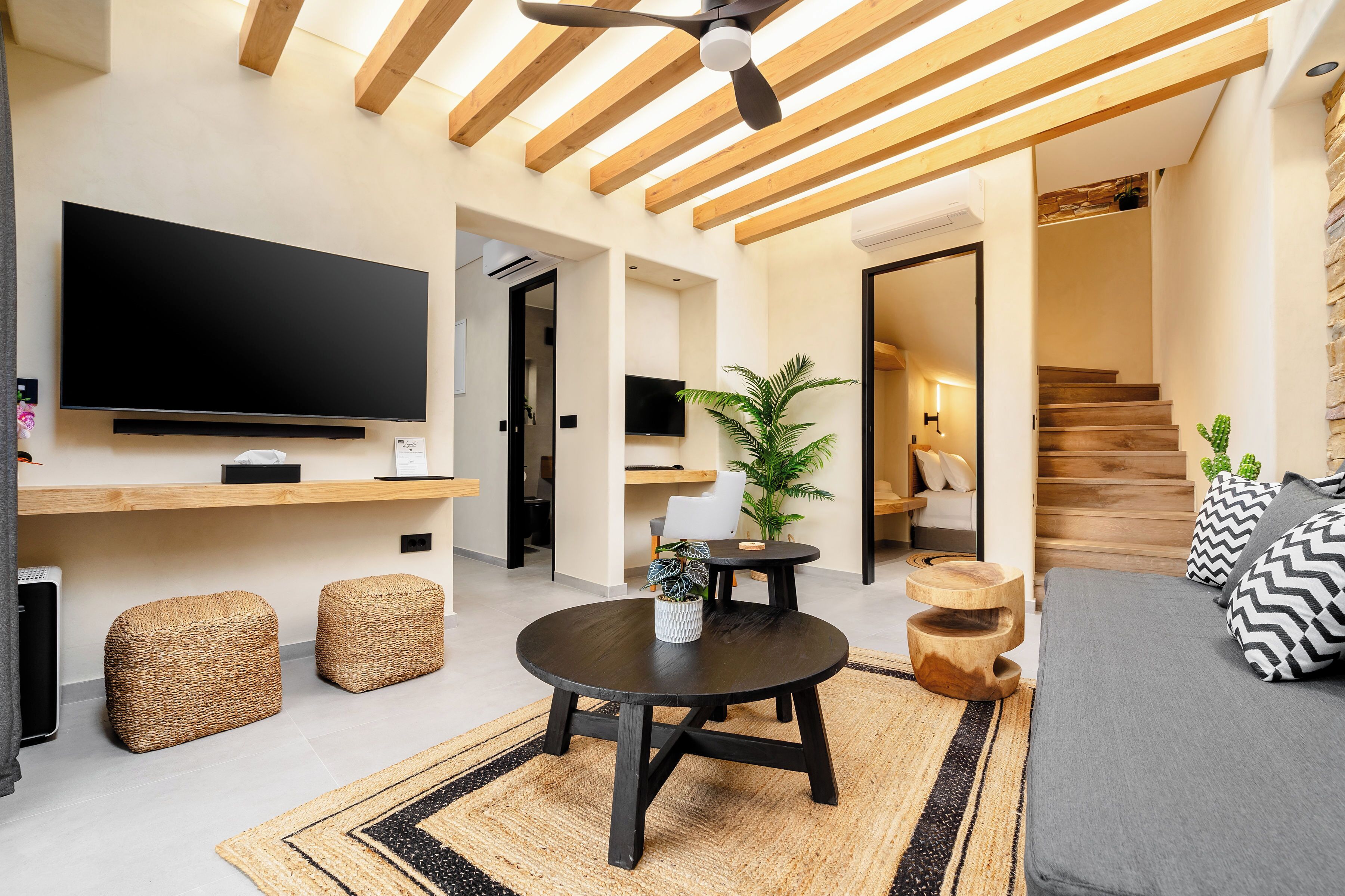 Exclusive Apartment, Private Pool | Living area | 55-inch Smart TV with satellite channels, computer monitors