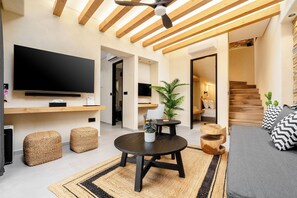 Exclusive Apartment, Private Pool | Living area | 55-inch Smart TV with satellite channels, computer monitors - Legato Spa Suites With Private Pool (Naxos)