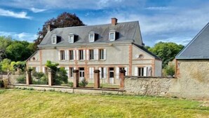 A large, two-story house with a stone facade, multiple windows, and a well-maintained lawn. - Château de la Malmaison (103859379) (Aÿ-Champagne)