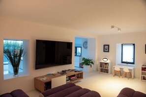 Smart TV, foosball, books