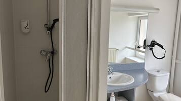 Hair dryer, towels, soap, shampoo
