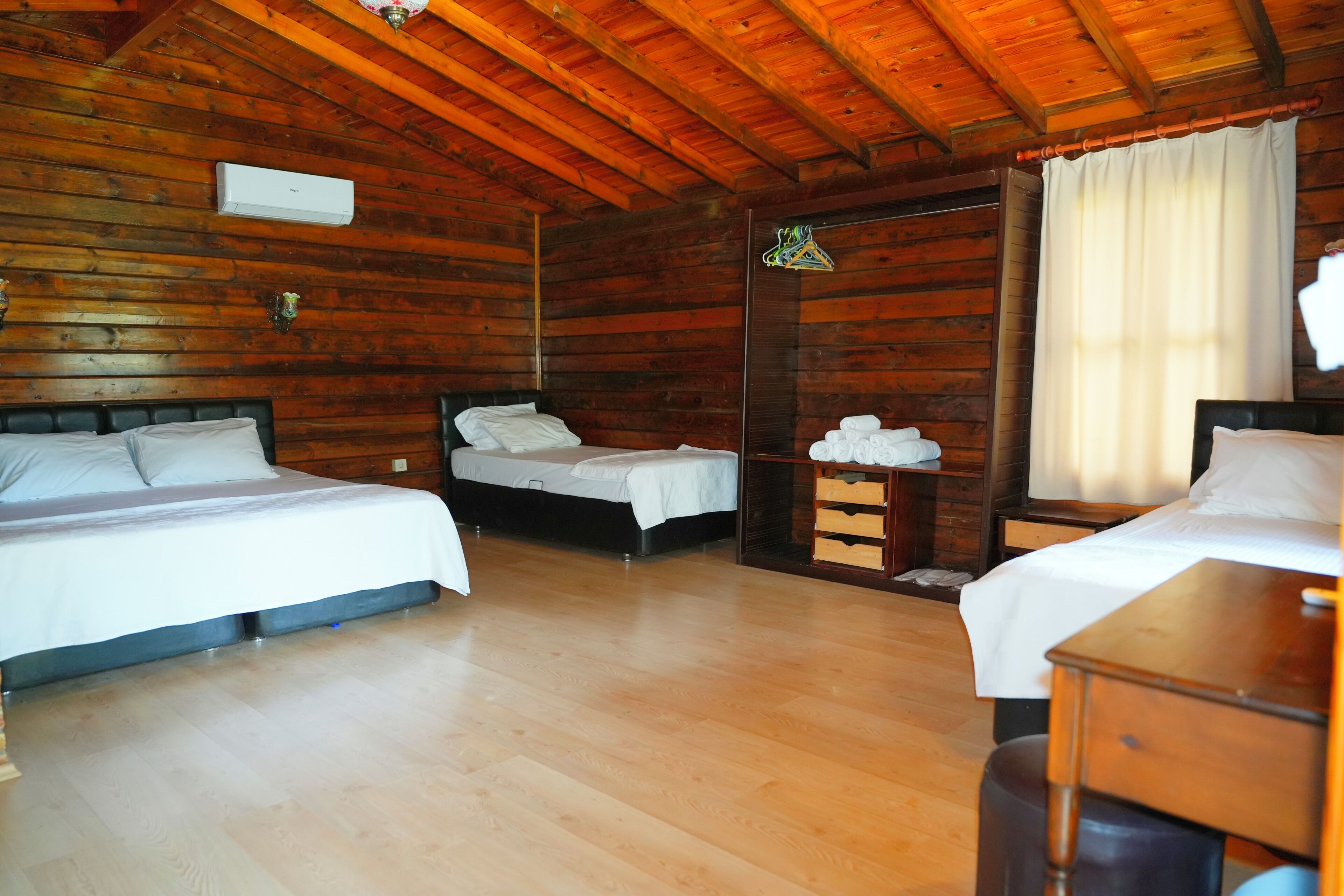 Premium bedding, desk, laptop workspace, free WiFi