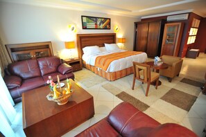 Premium bedding, minibar, laptop workspace, free cribs/infant beds