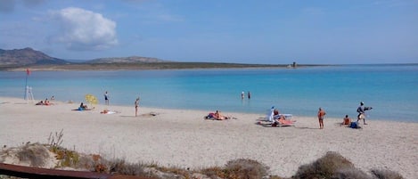 Beach nearby, white sand, beach shuttle, beach umbrellas