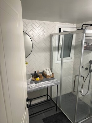 Hair dryer, towels, soap, shampoo