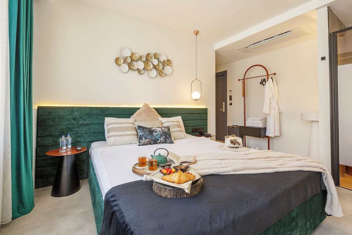 Superior kamer | Hypoallergeen beddengoed, een minibar, een kluis op de kamer