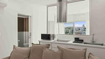 Luxury Suite | 1 bedroom, in-room safe, blackout drapes, iron/ironing board