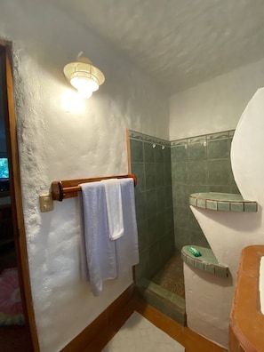 Shower, hair dryer, towels, soap