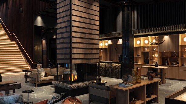 Un interior moderno con chimenea, zona de estar y detalles de madera.