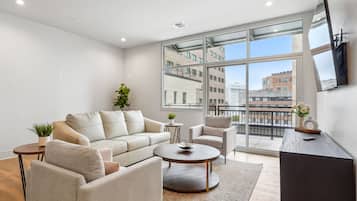 Premium Condo, 4 Bedrooms, Patio, City View | Living area