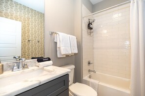 Hair dryer, towels, soap, shampoo